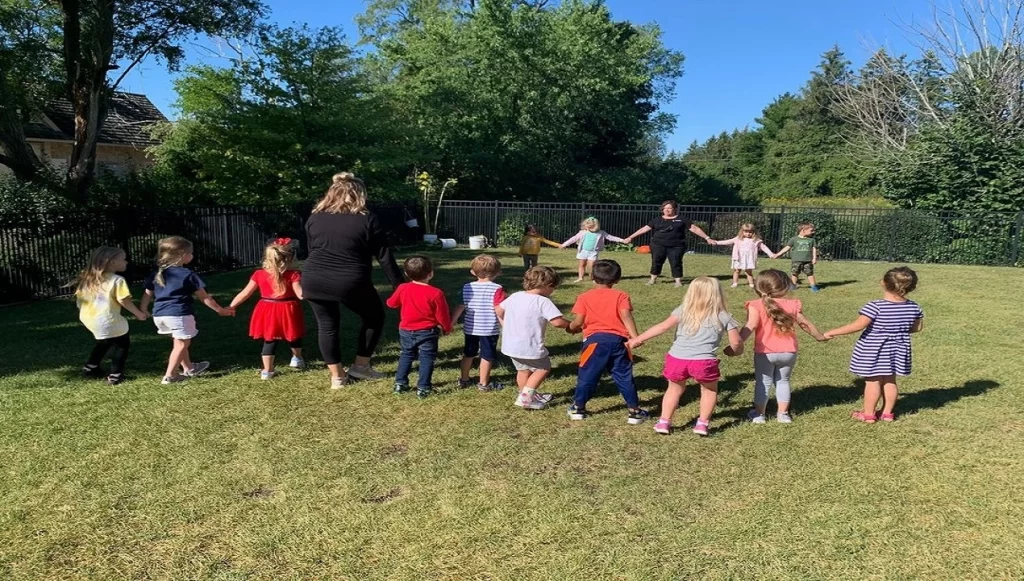 a group of child playing Red Rover